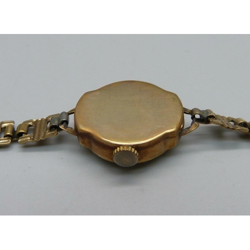 987 - A lady's 9ct gold Precimax wristwatch on a 9ct gold strap, total weight with movement 12g, boxed