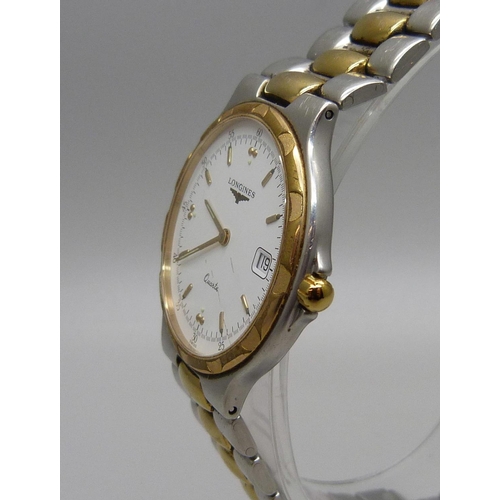 990 - A Longines quartz wristwatch, requires clasp