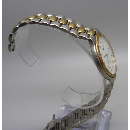 990 - A Longines quartz wristwatch, requires clasp