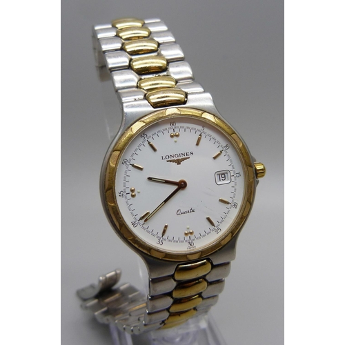 990 - A Longines quartz wristwatch, requires clasp