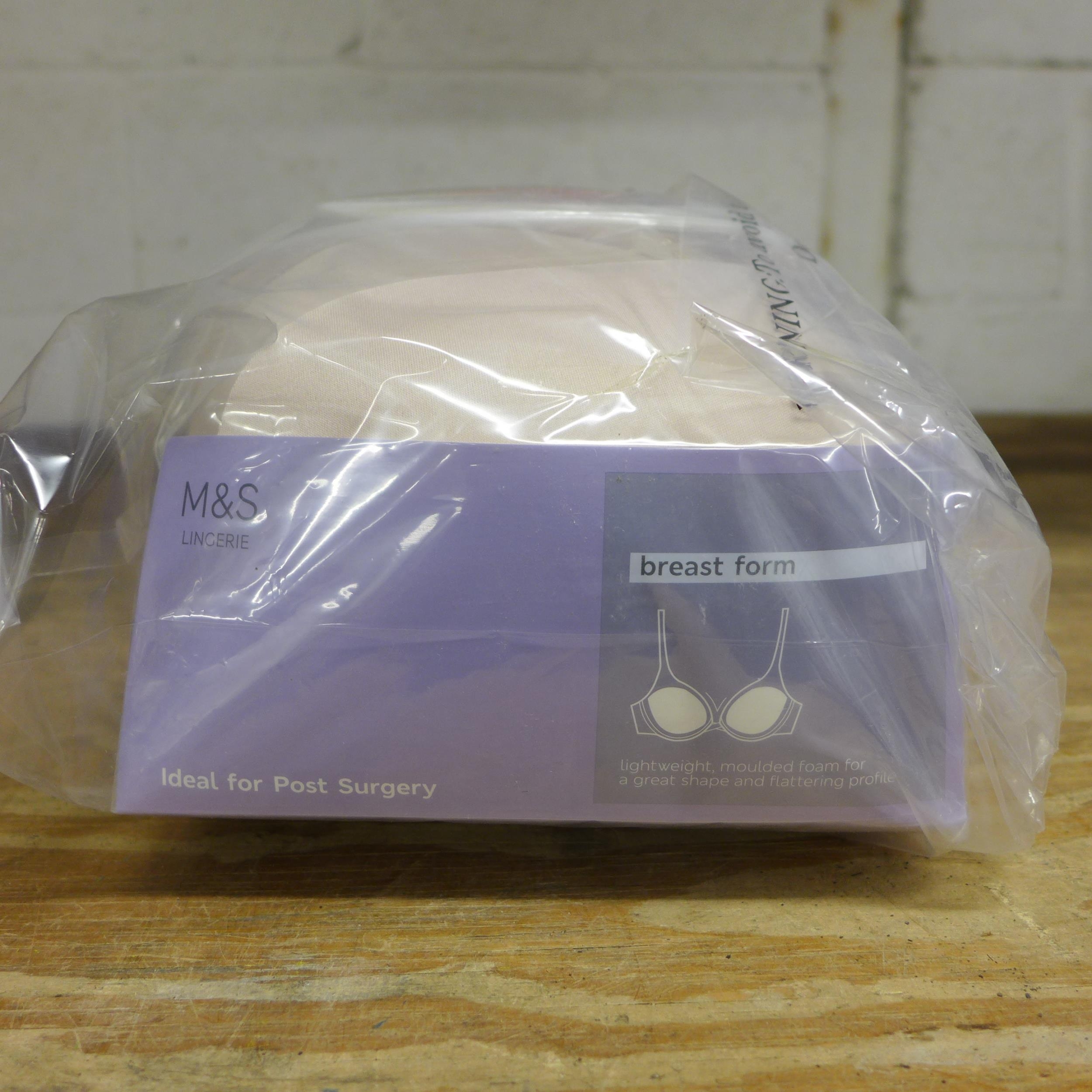 Two boxes of M&S breast form bras - 24 per box