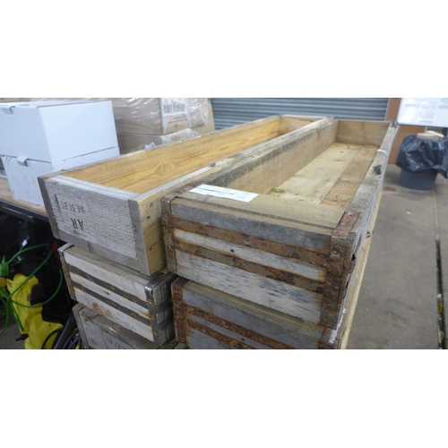 2338 - Two 5ft x 1ft wooden planters