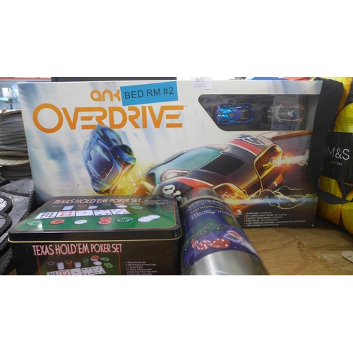 2373 - An Overdrive car racing game and 2 poker sets