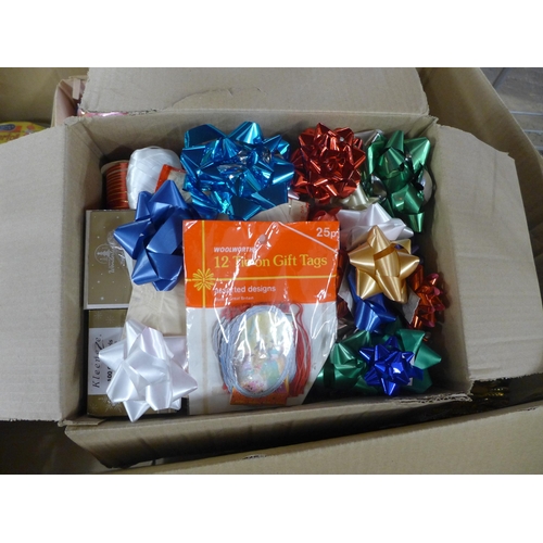 2384 - A quantity of Christmas baubles, wrapping paper, tags, etc.