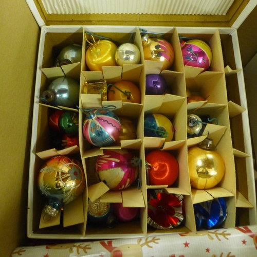 2384 - A quantity of Christmas baubles, wrapping paper, tags, etc.