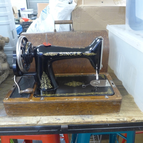 2434 - A manual Singer sewing machine in wooden case - serial no:- Y1624884