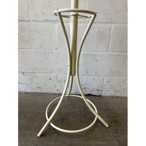 1603 - A cream painted metal coat stand