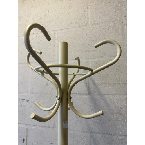 1603 - A cream painted metal coat stand