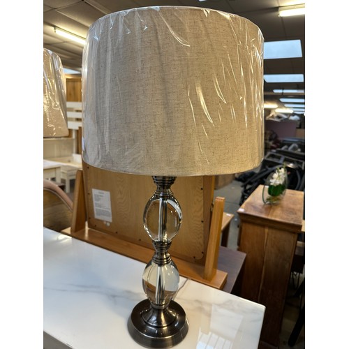 1634A - A glass bubble based table lamp with oatmeal shade