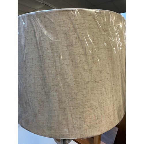 1634A - A glass bubble based table lamp with oatmeal shade