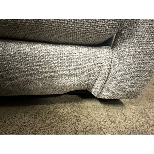 1605 - A grey textured weave upholstered four seater sofa with patterned scatter cushions