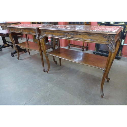 120 - A pair of 19th Century French walnut and marble topped single drawer two tier serving tables