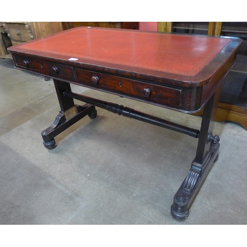 121 - A William IV mahogany and red leather topped two drawer writing table