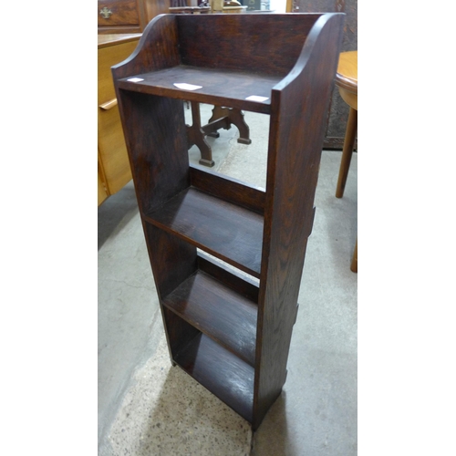 126 - A small Arts and Crafts oak open bookcase