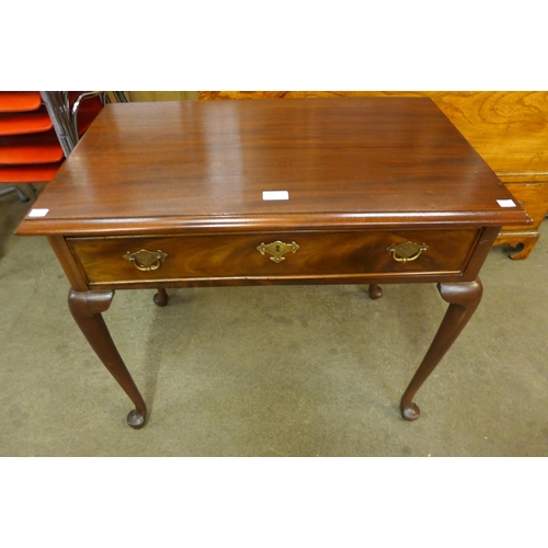 135 - A George III mahogany single drawer side table