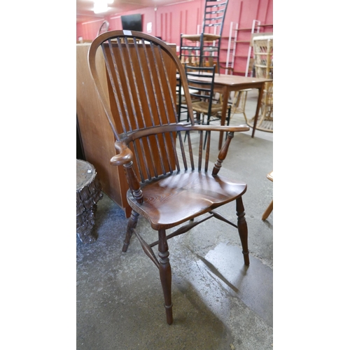 170 - A 19th Century style elm and beech highback Windsor chair