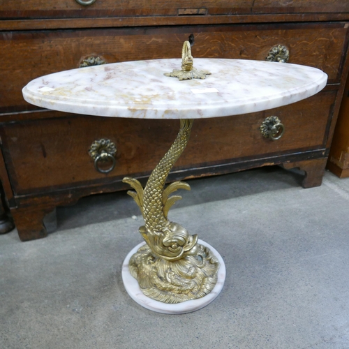 184 - An Italian brass dolphin based and marble topped wine table