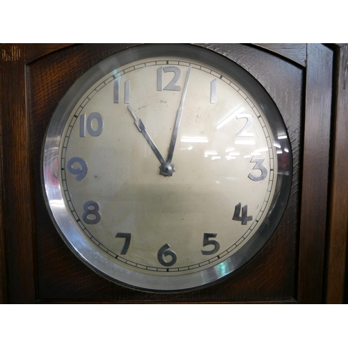 197 - An Art Deco oak triple weight longcase clock