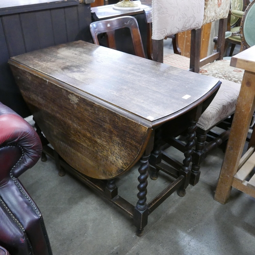 205 - An oak barleytwist gateleg table