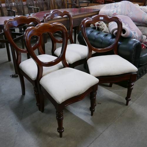 237 - A set of four Victorian mahogany balloon back dining chairs