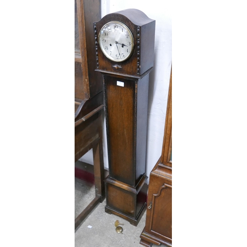 248 - An oak dwarf longcase clock