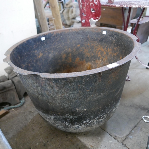 275 - A cast iron cauldron