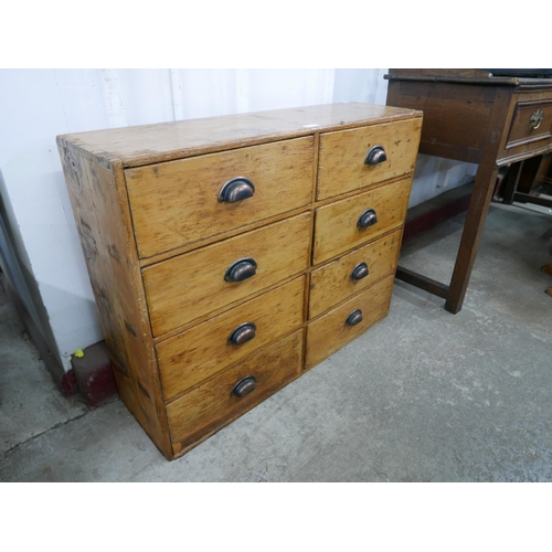 285 - A small Victorian pine eight drawer chest