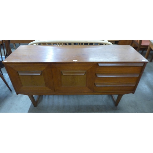 30 - A teak sideboard