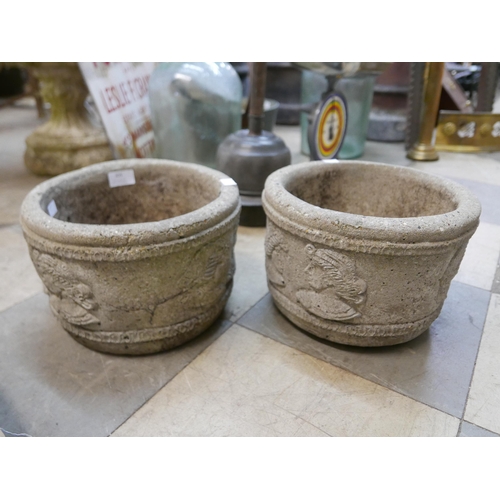 305 - A pair of concrete circular garden planters