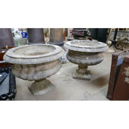 311 - A pair of concrete garden circular planters