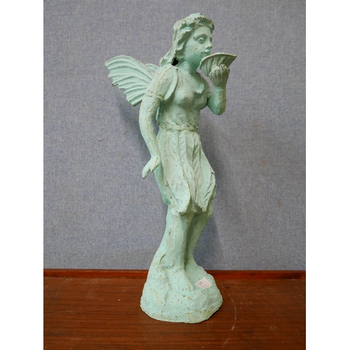 329 - A cast iron garden figure of a fairy