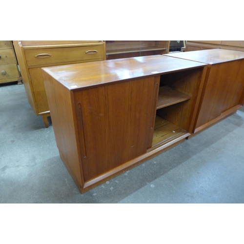 38 - A pair of Danish Chr. Linneberg teak cupboards