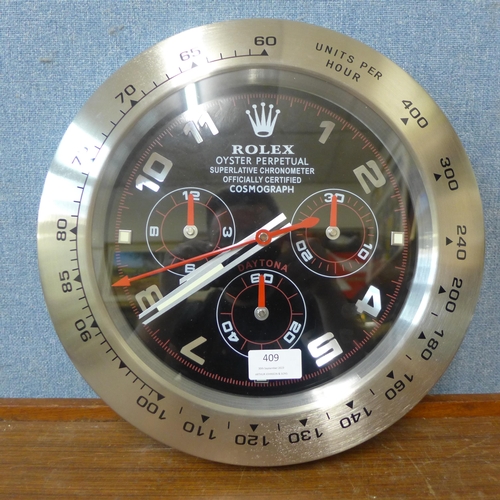 409 - A Rolex style dealer's display wall clock