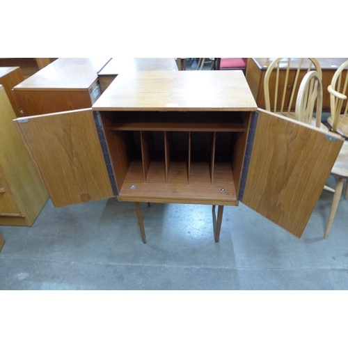 44 - A teak record cabinet