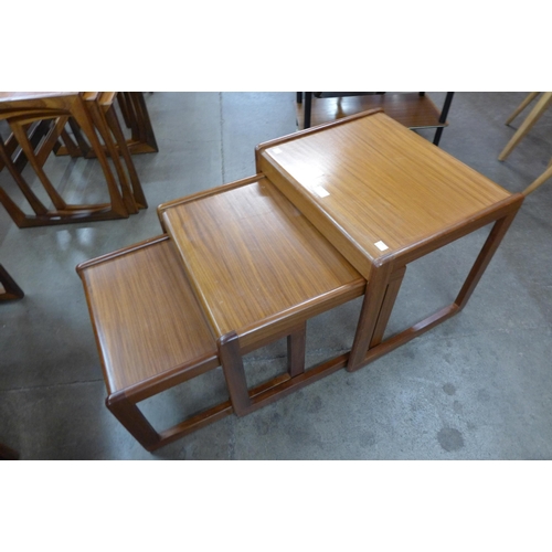 6 - A teak nest of tables