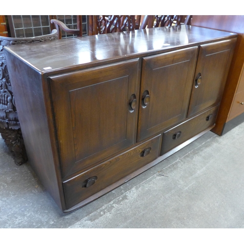 88 - An Ercol Golden Dawn elm Windsor sideboard