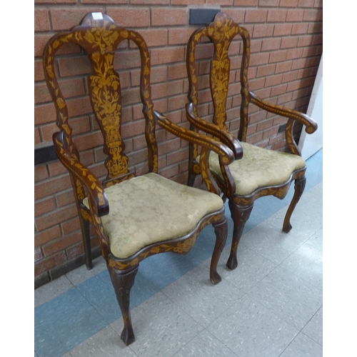 97 - A pair of 19th Century Dutch marquetry inlaid mahogany armchairs