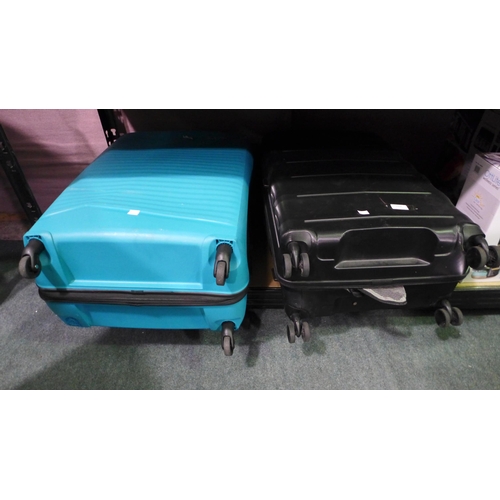 3406 - Two American Tourister Suitcases (304-133,240) * This lot is subject to VAT