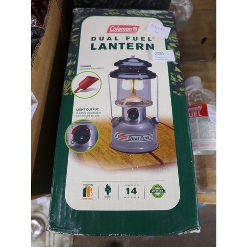 2285 - A duel fuel lantern with bottle of fuel