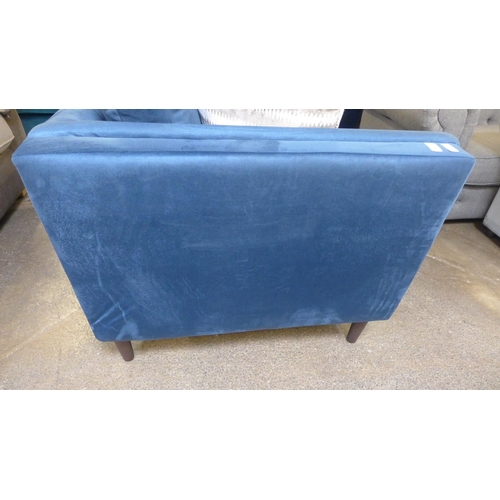 1303 - A navy blue upholstered two seater sofa with patterned scatter cushions