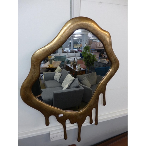 1326 - A gold metal framed drip effect mirror