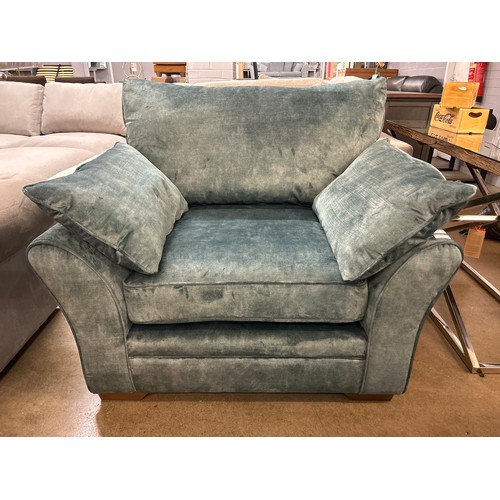 1338 - A sharkskin effect emerald velvet loveseat RRP £799