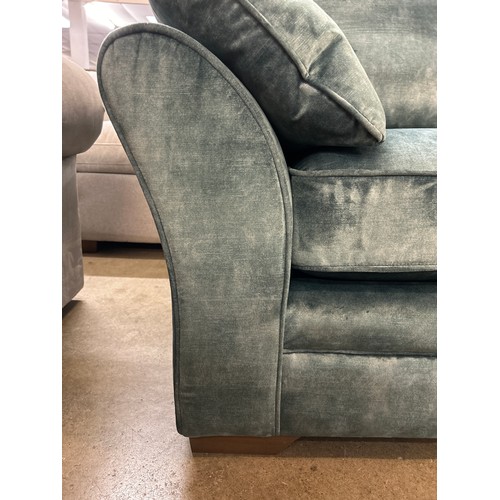 1338 - A sharkskin effect emerald velvet loveseat RRP £799