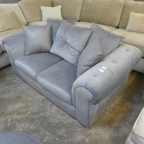 1361 - A grey velvet upholstered scatter back two seater sofa