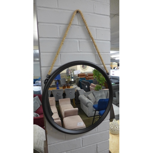 1391 - A medium round black metal mirror on a hanging rope H46cm (JRG1809)