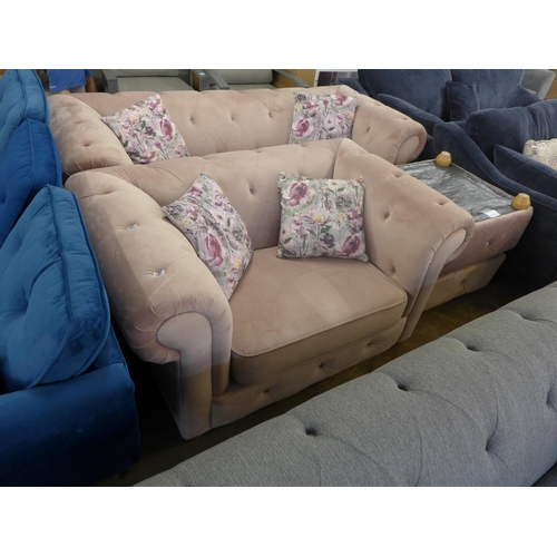 1392 - A cherry blossom velvet upholstered Chesterfield style three seater love seat and pair of footstools