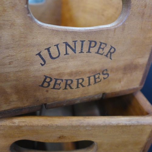 1432 - A set of three stacking 'Walter Grundy & Son' storage boxes