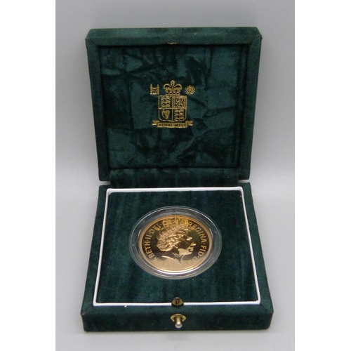 1052 - The Royal Mint UK Brilliant Uncirculated Five Pound coin, 1999, cased