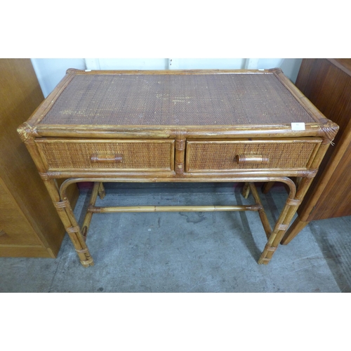 84 - A bamboo and rattan two drawer desk