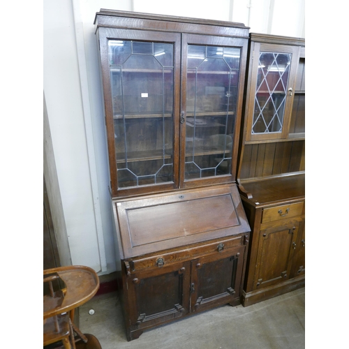 269 - An early 20th Century oak bureau bookcase